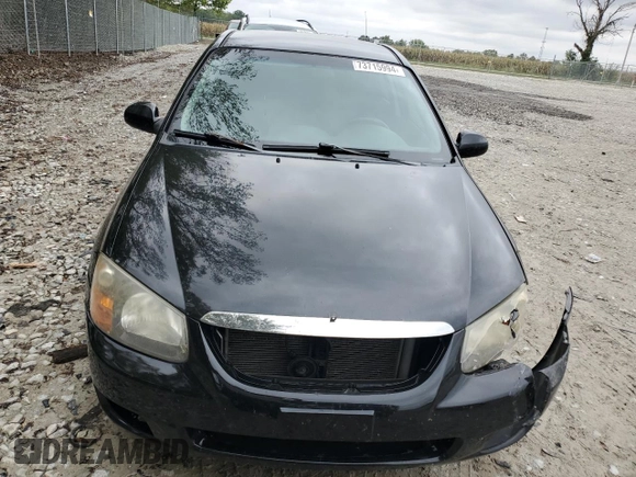 2009 Kia Spectra EX with VIN KNAFE221395026165, listed as a Copart auction lot 73715994 with 245,813 mi miles and Salvage Title. Bid and sale history available at carsss.com. Image 5.
