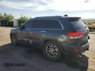 2014 Jeep Grand Cherokee Limited with VIN 1C4RJFBT6EC410774, listed as a Copart auction lot 58011005 with 166,506 mi miles and Salvage title. Bid and sale history available at DreamBid. Image 2.