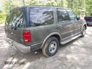 2001 Ford Expedition Eddie Bauer with VIN 1FMRU17W11LA02654, listed as a IAAI auction lot 42147534 with Not provided miles and . Bid and sale history available at DreamBid. Image 4.