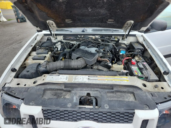 2002 Ford Explorer Sport Value с VIN 1FMYU60E22UB20203, выставлен на аукционе Copart как лот 61417875 с пробегом 204 093 миль миль и Списание • Salvage title. История ставок и продаж доступна на DreamBid. Изображение 12.