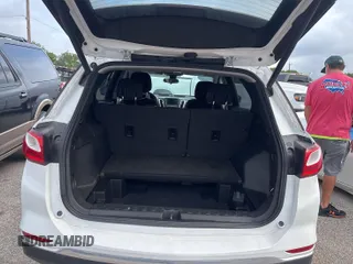 2020 Chevrolet Equinox LT z VIN 2GNAXJEV0L6158433, wystawiony jako IAAI lot #42556113 z przebiegiem 82 277 mil mil oraz . Historia ofert i sprzedaży dostępna na DreamBid. Obrazek 17.