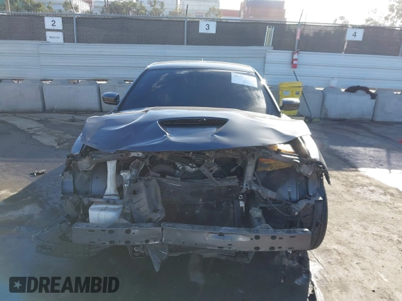 2019 Dodge Charger Scat Pack with VIN 2C3CDXGJ7KH588717, listed as a IAAI auction lot 41694673 with Not Provided miles and . Bid and sale history available at DreamBid. Image 11.