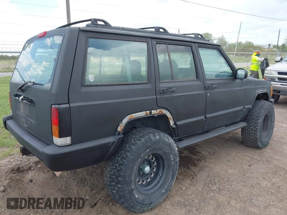 1997 Jeep Cherokee Sport with VIN 1J4FJ68S0VL576171, listed as a IAAI auction lot 42588055 with 212,360 mi miles and . Bid and sale history available at DreamBid. Image 4.