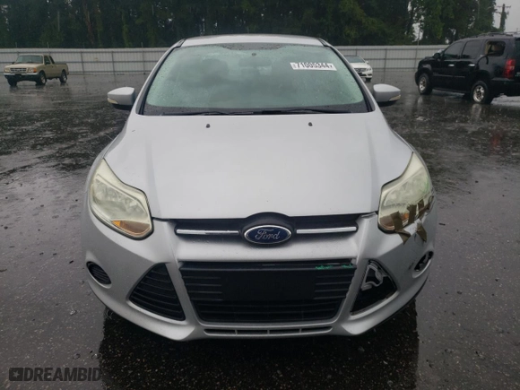 2014 Ford Focus SE with VIN 1FADP3F22EL103956, listed as a Copart auction lot 71005344 with 102,509 mi miles and Salvage Title. Bid and sale history available at carsss.com. Image 5.