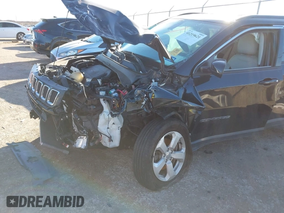 2019 Jeep Compass Latitude with VIN 3C4NJCBB1KT851846, listed as a IAAI auction lot 41219621 with 56,626 mi miles and . Bid and sale history available at DreamBid. Image 6.