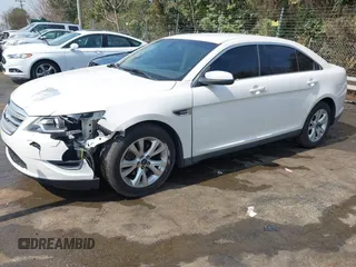 2012 Ford Taurus SEL with VIN 1FAHP2EW9CG121263, listed as a IAAI auction lot 41785838 with 185,433 mi miles and . Bid and sale history available at DreamBid. Image 2.