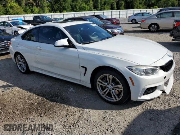 2014 BMW 4 Series 435i xDrive with VIN WBA3R5C59EK187836, listed as a Copart auction lot 63946075 with 100,700 mi miles and Salvage title. Bid and sale history available at DreamBid. Image 4.