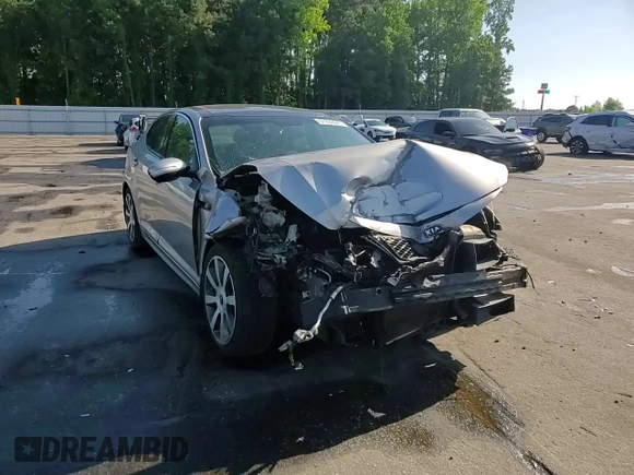 2011 Kia Optima SX z VIN KNAGR4A65B5161039, wystawiony jako Copart lot #57889545 z przebiegiem Nie podano mil oraz Szkoda całkowita • Salvage title. Historia ofert i sprzedaży dostępna na DreamBid. Obrazek 14.