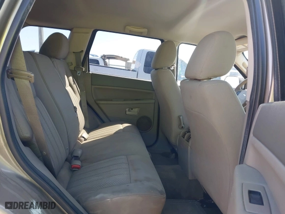 2005 Jeep Grand Cherokee Laredo with VIN 1J4GR48K25C714911, listed as a IAAI auction lot 41987103 with 191,157 mi miles. Bid and sale history available at carsss.com. Image 8.