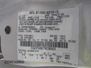 2007 Ford Focus S with VIN 1FAFP34N77W280431, listed as a IAAI auction lot 42120858 with 108,665 mi miles and . Bid and sale history available at carsss.com. Image 9.