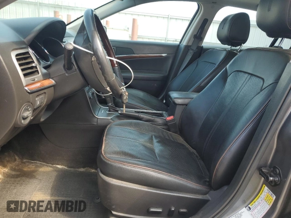 2012 Lincoln MKZ z VIN 3LNHL2JC9CR830958, wystawiony jako Copart lot #56486485 z przebiegiem 205 402 mil mil oraz Nie do naprawy • Non repairable. Historia ofert i sprzedaży dostępna na DreamBid. Obrazek 7.