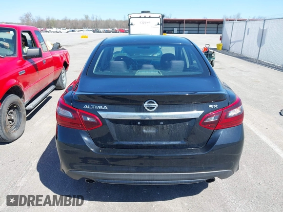 2018 Nissan Altima SV with VIN 1N4AL3AP5JC285843, listed as a IAAI auction lot 41956374 with 100,688 mi miles and . Bid and sale history available at carsss.com. Image 16.