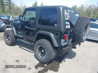 2005 Jeep Wrangler X z VIN 1J4FA39S45P382880, wystawiony jako IAAI lot #42129610 z przebiegiem 191 864 mil mil oraz . Historia ofert i sprzedaży dostępna na DreamBid. Obrazek 3.