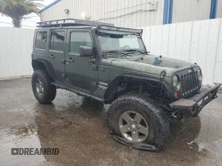 2012 Jeep Wrangler Unlimited Sport with VIN 1C4HJWDG8CL122067, listed as a Copart auction lot 58549805 with 124,658 mi miles and Clean title. Bid and sale history available at DreamBid. Image 4.