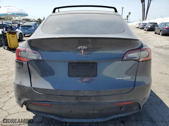 2021 Tesla Model Y Long Range with VIN 5YJYGDEEXMF070154, listed as a Copart auction lot 50742325 with 23,376 mi miles and Salvage Title. Bid and sale history available at carsss.com. Image 6.
