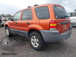 2007 Ford Escape XLT with VIN 1FMYU93177KA38867, listed as a IAAI auction lot 41652994 with 136,730 mi miles. Bid and sale history available at carsss.com. Image 3.