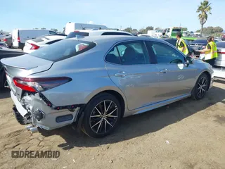 2023 Toyota Camry SE z VIN 4T1T11AK0PU153203, wystawiony jako IAAI lot #38763517 z przebiegiem 11 171 mil mil oraz . Historia ofert i sprzedaży dostępna na DreamBid. Obrazek 4.
