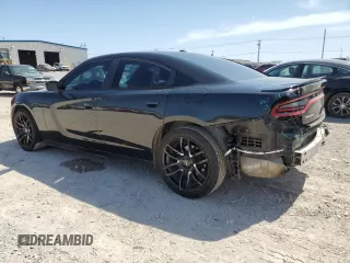 2015 Dodge Charger SE with VIN 2C3CDXBG3FH722124, listed as a Copart auction lot 50541805 with 106,847 mi miles and Salvage Title. Bid and sale history available at carsss.com. Image 2.