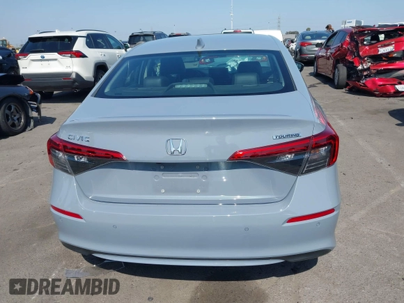 2023 Honda Civic Touring with VIN 2HGFE1F92PH322377, listed as a IAAI auction lot 42361473 with 43,533 mi miles and . Bid and sale history available at DreamBid. Image 15.