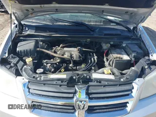2010 Dodge Grand Caravan SXT with VIN 2D4RN5D19AR406197, listed as a IAAI auction lot 41854505 with 140,760 mi miles and . Bid and sale history available at DreamBid. Image 10.