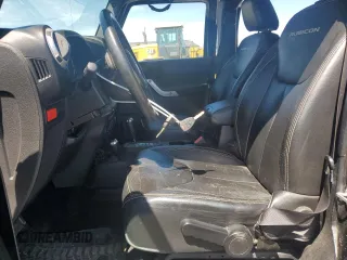 2014 Jeep Wrangler Unlimited Rubicon с VIN 1C4BJWFG7EL119344, выставлен на аукционе Copart как лот 65652265 с пробегом 150 934 миль миль и Списание • Salvage title. История ставок и продаж доступна на DreamBid. Изображение 7.