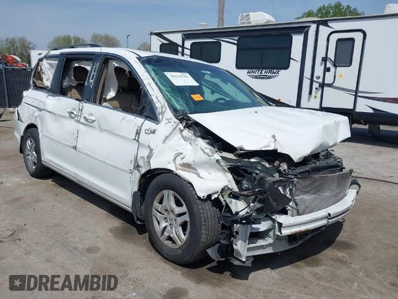 2007 Honda Odyssey EX-L with VIN 5FNRL38617B141003, listed as a IAAI auction lot 39232543 with 195,096 mi miles and . Bid and sale history available at DreamBid. Image 1.