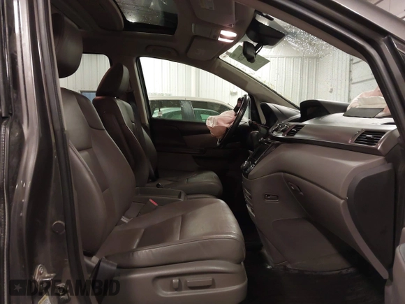 2016 Honda Odyssey Touring Elite with VIN 5FNRL5H92GB045824, listed as a IAAI auction lot 41872220 with 120,557 mi miles. Bid and sale history available at carsss.com. Image 5.
