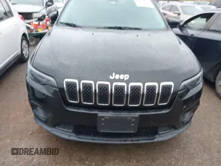 2019 Jeep Cherokee Latitude with VIN 1C4PJLCB4KD220229, listed as a IAAI auction lot 41179101 with 63,099 mi miles and . Bid and sale history available at DreamBid. Image 12.