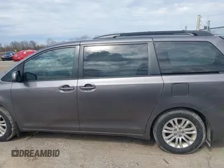 2014 Toyota Sienna XLE with VIN 5TDYK3DC4ES463315, listed as a IAAI auction lot 42108050 with 197,140 mi miles. Bid and sale history available at carsss.com. Image 14.