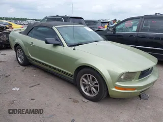 2005 Ford Mustang Deluxe with VIN 1ZVFT84N555249312, listed as a IAAI auction lot 42145721 with 334,417 mi miles. Bid and sale history available at carsss.com. Image 1.