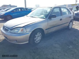 2000 Honda Civic LX with VIN 1HGEJ6679YL066102, listed as a IAAI auction lot 41585270 with 164,714 mi miles. Bid and sale history available at carsss.com. Image 2.