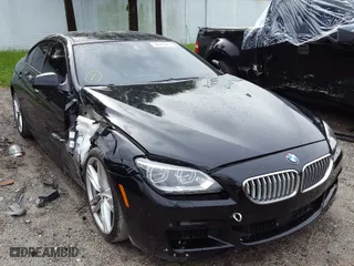 2015 BMW 6 Series 650i with VIN WBA6B2C57FGB99166, listed as a Copart auction lot 39443480 with 41,812 mi miles and Non Repairable. Bid and sale history available at carsss.com. Image 1.