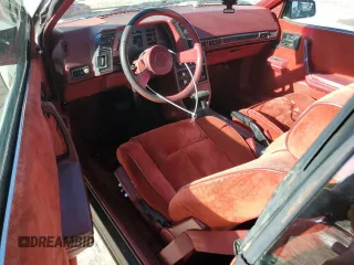 1986 Chevrolet Cavalier with VIN 1G1JE67W3G7172570, listed as a Copart auction lot 87169464 with 173,529 mi miles and Clean Title. Bid and sale history available at DreamBid. Image 8.