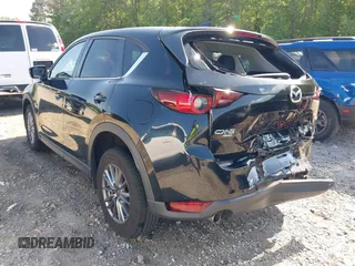 2017 Mazda CX-5 Touring z VIN JM3KFBCL0H0209458, wystawiony jako IAAI lot #42169599 z przebiegiem 93 287 mil mil oraz . Historia ofert i sprzedaży dostępna na DreamBid. Obrazek 3.