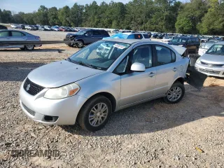 2012 Suzuki SX4 LE with VIN JS2YC5A38C6302644, listed as a Copart auction lot 45696145 with 162,691 mi miles and Salvage Title. Bid and sale history available at carsss.com. Image 1.
