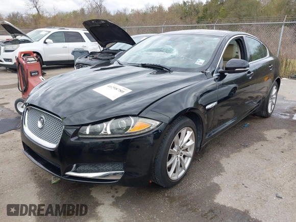 2013 Jaguar XF I4 RWD with VIN SAJWA0ES3DPS74714, listed as a IAAI auction lot 41298780 with 130,359 mi miles. Bid and sale history available at carsss.com. Image 2.