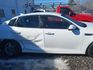 2019 Kia Optima LX with VIN 5XXGT4L33KG339985, listed as a IAAI auction lot 41218499 with 119,007 mi miles. Bid and sale history available at carsss.com. Image 13.