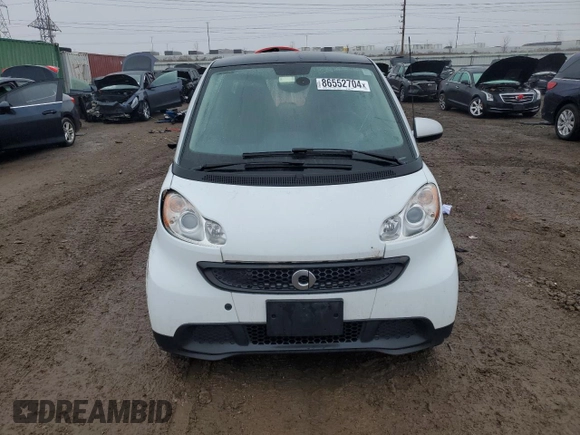 2015 Smart fortwo Passion z VIN WMEEJ3BA3FK791701, wystawiony jako Copart lot #86552704 z przebiegiem 27 313 mil mil oraz Szkoda całkowita • Salvage title. Historia ofert i sprzedaży dostępna na DreamBid. Obrazek 5.