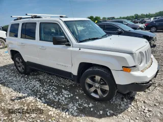 2015 Jeep Patriot High Altitude with VIN 1C4NJRFB5FD114125, listed as a Copart auction lot 62475615 with 104,438 mi miles and Salvage title. Bid and sale history available at DreamBid. Image 4.