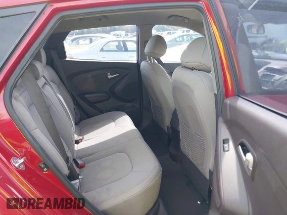 2010 Hyundai Tucson GLS with VIN KM8JT3AC1AU097317, listed as a IAAI auction lot 41758296 with 108,695 mi miles and . Bid and sale history available at DreamBid. Image 8.