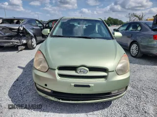 2007 Hyundai Accent SE z VIN KMHCN36C07U035170, wystawiony jako Copart lot #58201395 z przebiegiem 154 388 mil mil oraz Szkoda całkowita • Salvage title. Historia ofert i sprzedaży dostępna na DreamBid. Obrazek 5.