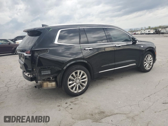 2021 Cadillac XT6 Premium Luxury z VIN 1GYKPCRS1MZ169952, wystawiony jako Copart lot #51908895 z przebiegiem 31 834 mil mil oraz Szkody całkowita. Historia ofert i sprzedaży dostępna na DreamBid. Obrazek 3.