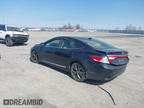 2013 Hyundai Azera with VIN KMHFH4JG6DA233205, listed as a IAAI auction lot 41643389 with 200,842 mi miles and . Bid and sale history available at carsss.com. Image 3.