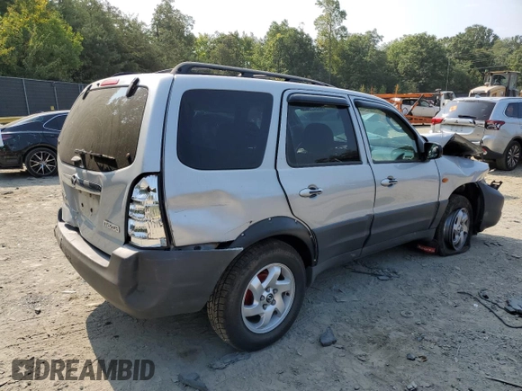 2003 Mazda Tribute DX with VIN 4F2YZ02B83KM52472, listed as a Copart auction lot 68642804 with 179,193 mi miles and Salvage Title. Bid and sale history available at carsss.com. Image 3.