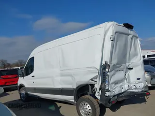 2023 Ford Transit Cargo с VIN 1FTBR2CG4PKB83534, выставлен на аукционе IAAI как лот 41243389 с пробегом 5 507 миль миль и . История ставок и продаж доступна на DreamBid. Изображение 14.