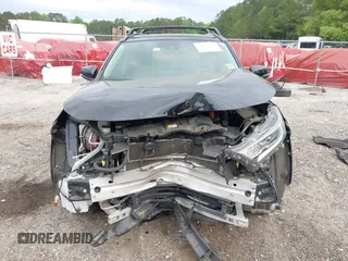 2021 Toyota RAV4 Hybrid XLE with VIN JTMRWRFV2MD133113, listed as a IAAI auction lot 42087394 with 103,019 mi miles and . Bid and sale history available at DreamBid. Image 12.