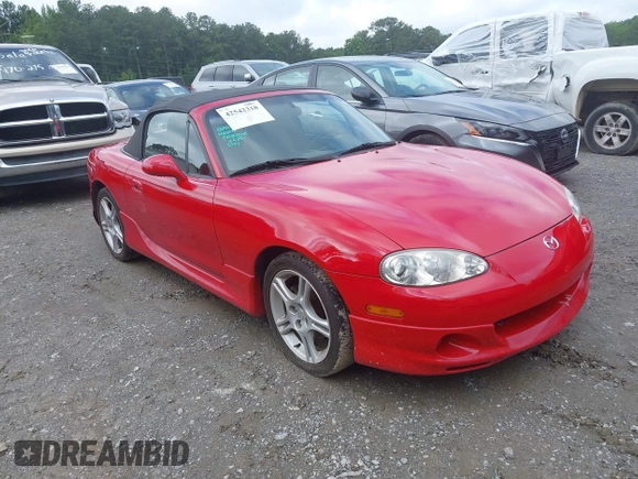 2004 Mazda MX-5 Miata LS with VIN JM1NB353440401450, listed as a IAAI auction lot 42542318 with 106,950 mi miles and . Bid and sale history available at DreamBid. Image 1.