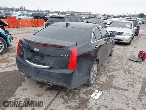 2018 Cadillac ATS RWD z VIN 1G6AA5RX7J0183805, wystawiony jako IAAI lot #41398076 z przebiegiem 103 784 mil mil oraz . Historia ofert i sprzedaży dostępna na DreamBid. Obrazek 4.