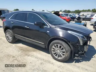 2019 Cadillac XT5 Luxury AWD with VIN 1GYKNDRS9KZ287367, listed as a Copart auction lot 59782755 with 44,407 mi miles and Salvage title. Bid and sale history available at DreamBid. Image 4.