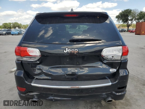 2014 Jeep Grand Cherokee Overland with VIN 1C4RJECG9EC173693, listed as a Copart auction lot 53747045 with 73,234 mi miles and Non Repairable. Bid and sale history available at carsss.com. Image 6.